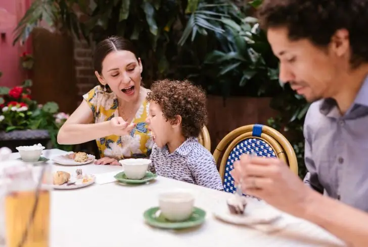 Families Enjoying a Relaxing Meal