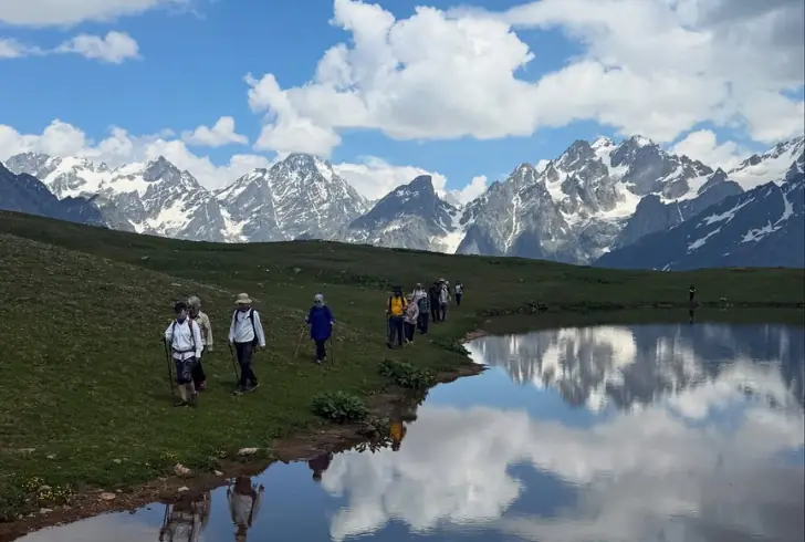 Hikers walking near Mestia mountains